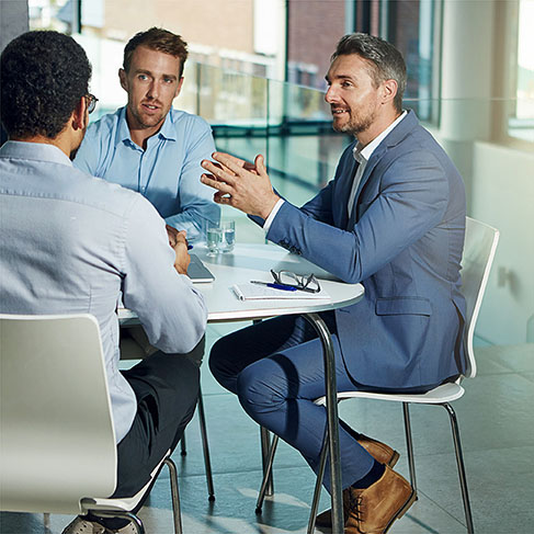 Corporate businessmen having an office meeting 